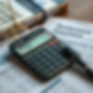 A calculator and documents representing financial aspects of renters insurance