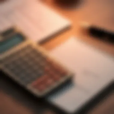 Financial Calculations A calculator and a notepad with financial calculations