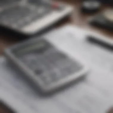 A close-up of a financing document with a calculator and pen, symbolizing the financial considerations for used campers.